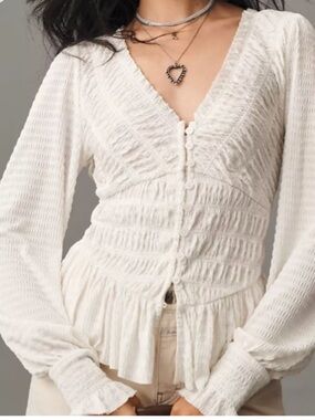 Anthropologie Smocked Peplum Top
